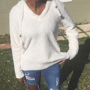 Fluffy white sweater